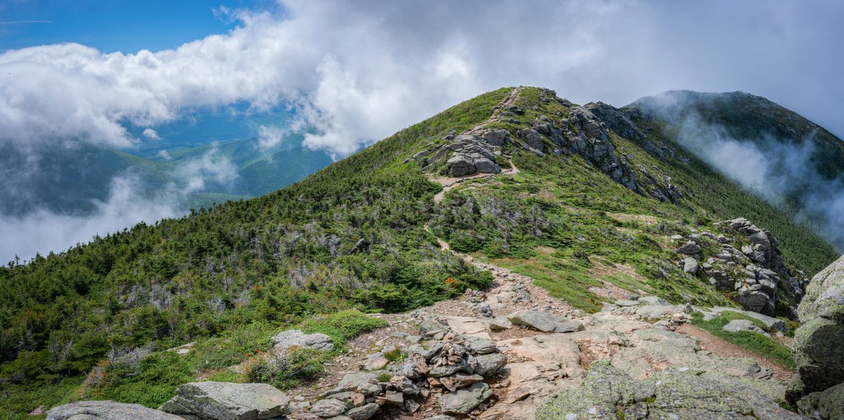RocheRealty's tweet photo. 8.5 miles. 3 peaks. 3,900 ft of elevation. 100% worth it. 🏔️🥾The Franconia Ridge Loop is easily one of the most spectacular hikes in the East. Walking above the treeline across Lafayette, Lincoln, and Little Haystack is unmatched.  
👇 Drop your best photo from the ridge! https://t.co/tM8Xw6x3od