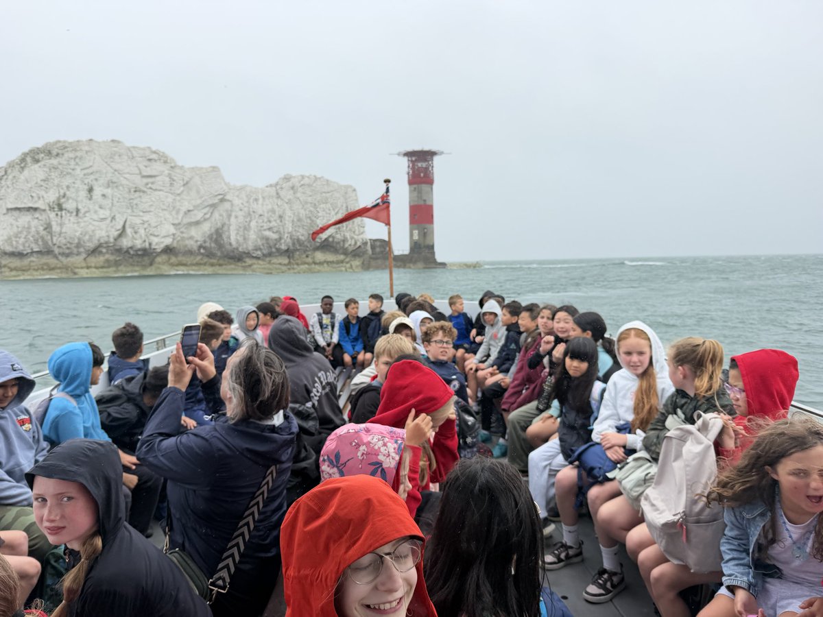 CCJacademy's tweet photo. An incredible afternoon on our Boat Cruise! 🚤 We sped right up close to the iconic white chalk rocks and the lighthouse. Everyone has found their sea legs now! 🌊⚓ #NeedlesCruise  #Year6Residential #IsleOfWight26 @LEOacademies https://t.co/ESyRKq9b8a