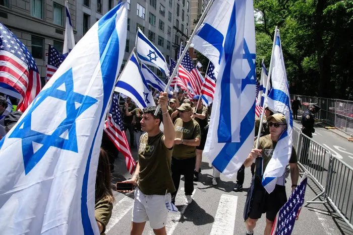 Johartz's tweet photo. @ZadeSmith4 @RealCandaceO Problen with lying on the internet? Its easy to debunk. Plenty of american flags at the israel day parade. Where are the American flags at the Palestinian solidarity marches? Or the ayatollah support group? https://t.co/tGE9g2DNEk