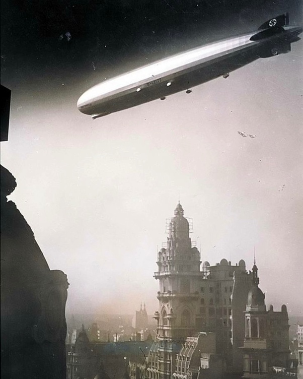 LaocoonofTroy's tweet photo. The Graf Zeppelin, flying over the Palacio Barolo in Buenos Aires, Argentina. June 30, 1934. https://t.co/SzdydR9Euy