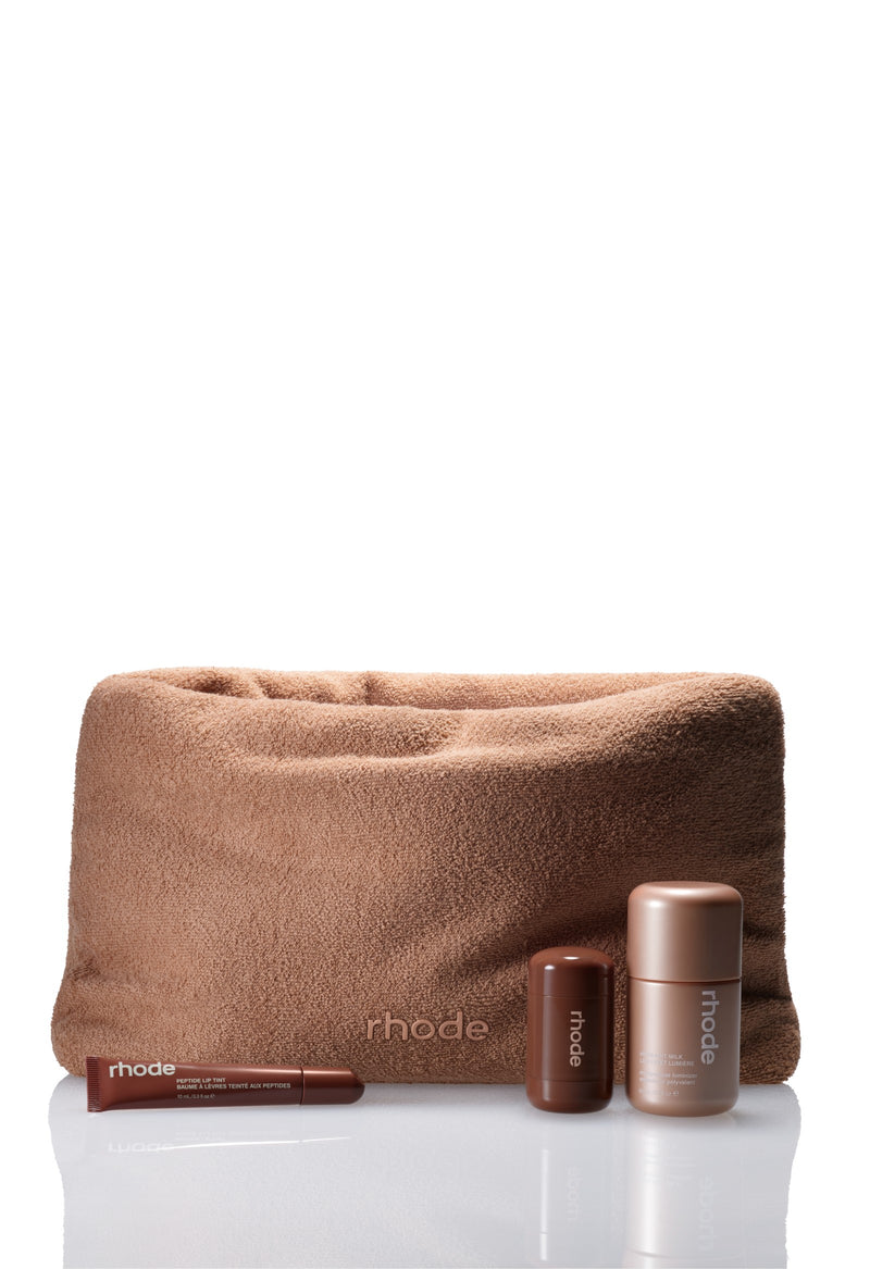 SkincareRhode's tweet photo. Highlighter milk, pocket bronzers, peptide lip tints, terry bag, matching phone cases are all part of the rhode summer collection 🤎 https://t.co/dwghcmp9Ms