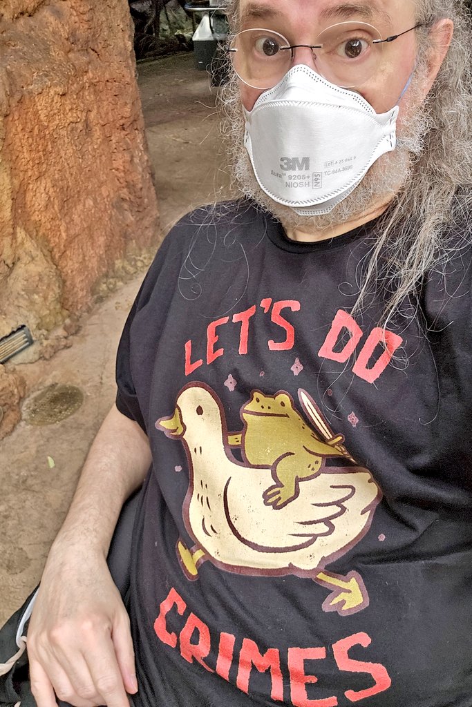 Radlein's tweet photo. In the Reptile House at @ZooATL 

I guess this sort of counts as a Pride Month shirt https://t.co/tysPFeIJ69