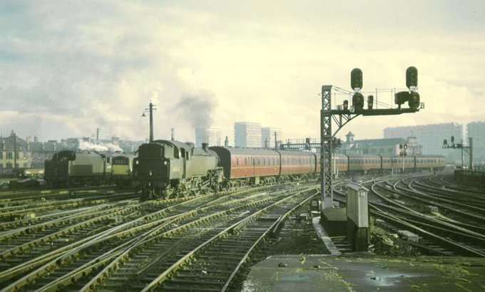 oakroyd's tweet photo. South #Glasgow horizon looking across approach to St. Enoch Railway Station, 1964. 
(Transport Museum) https://t.co/kcqx3a9N8e