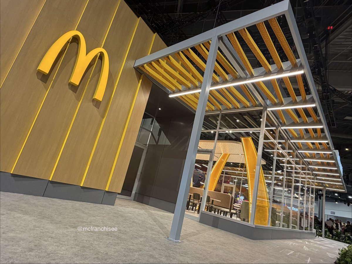 McFranchisee's tweet photo. Whoa. Benson Boone opened the show, Google’s CEO dropped some serious insights… but  what everyone’s talking about is @McDonalds unveiling their new design with playplace 🔥!

“McDonald’s Next”. More to come…

 #McDWW26 https://t.co/IDtd7BCg77