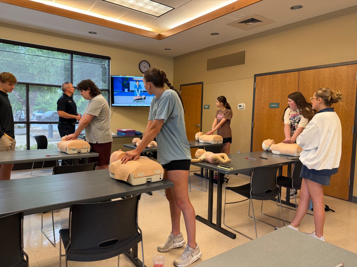 MetroWestFire's tweet photo. Last week, Metro West firefighter/paramedics spent time with summer camp counselors from the City of Ellisville Parks and Recreation, providing hands on training in CPR, AED use and first aid ahead of the busy summer camp season.

From recognizing emergencies to learning lifesaving skills, this training helps ensure counselors are prepared to respond with confidence should an emergency arise. We appreciate the City of Ellisville Parks and Recreation’s commitment to safety and the opportunity to support those caring for children throughout the summer. #YourLifeOurMission