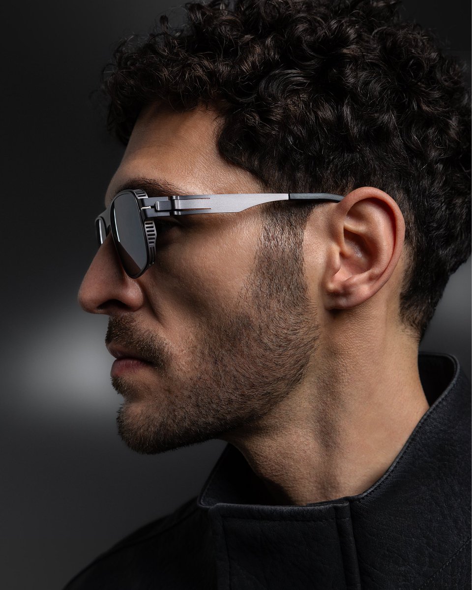 OVVOoptics's tweet photo. Helios in graphite reveals the architectural edge of the Ti2 Collection through integrated titanium rings, shield styling, and gunmetal flash polarized ZEISS lenses.

#OVVOoptics #Ti2Collection #TitaniumUnbound https://t.co/vtLgeX8v5j