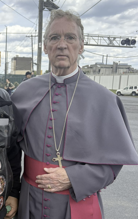jimmy_rustlin's tweet photo. The Catholic priest, is actually Bishop George Lucey, who is the president of the American National Catholic Church. Also a member of the HandsOffNY Antifa group. https://t.co/nfPEjovgls