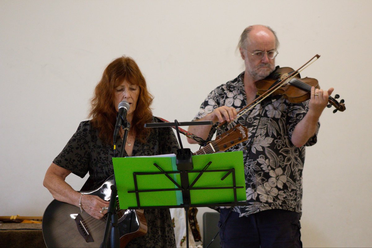 Primageographer's tweet photo. When I’m not ‘doing geography’ I’m lucky enough to be doing this! Playing our own songs as ‘Wild Roots’ alongside legends Lynn Gosney &amp; @CoorBlimeyGuv (check out his latest single). Latest gig also had Pete (from Touch the Earth) adding extra quality on violin. Pics Nina &amp; James https://t.co/kcfPyWpULn