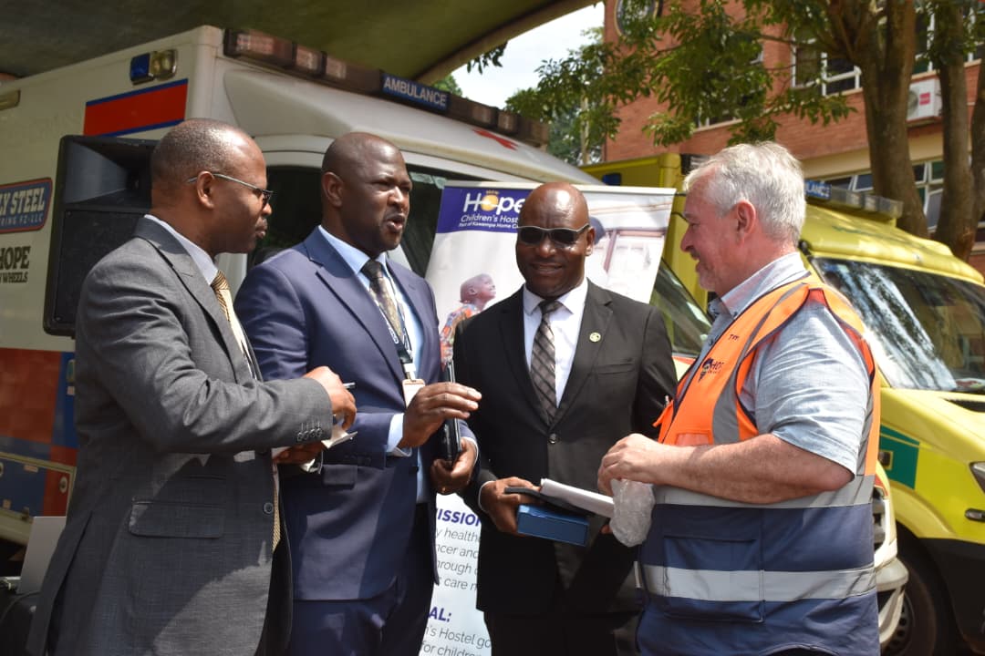 NagujjaSer6664's tweet photo. D-Day: Following a long journey from Ireland, the #HopeOnWheels team successfully arrived at the @MinofHealthUG  Headquarters for the official handover of 11 ambulances. The handover ceremony was witnessed by Dr. Charles Olaro, Director General of Health Services, https://t.co/zzHQL1AesL