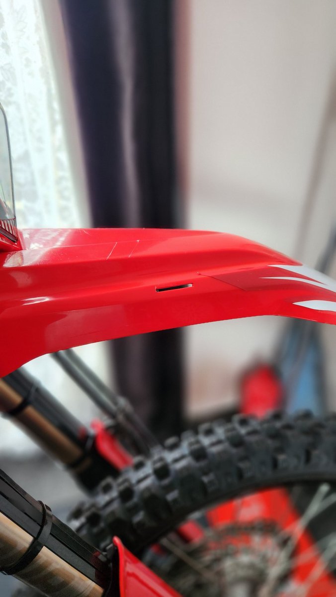 PJ1HondaPilot's tweet photo. Little dremle mod to the front mudguard to put a rubber strap around the fender bag. Got to make sure that it dont come off when im off road on the TET in Italy and France. Spare tube, levers, repair kit and valve cores onboard just incase. 💪🏻 #crf300l #lightisright https://t.co/UT90hTSJc8