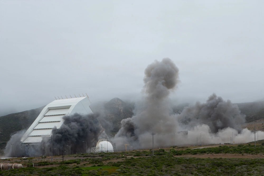 spacecoastwest's tweet photo. New photos released by the US Space Forse show today’s demolition of historic Vandenberg SLC-6 in order to make way for the new SpaceX Falcon Heavy West Coast launch pad, scheduled for completion later this year. https://t.co/31vHTaFZwN