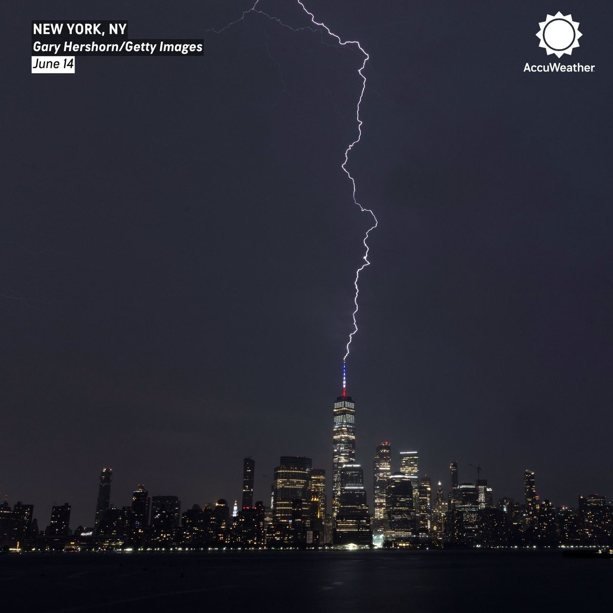 accuweather's tweet photo. Lightning struck One World Trade Center during a New York City thunderstorm on Sunday night ⚡ https://t.co/JQ6bgM5ATw