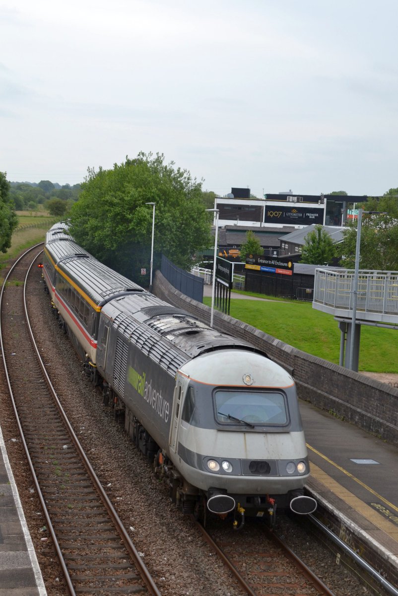 HavershamGreen's tweet photo. @railexpress @RailwayMagazine @railadventureen @InterCityRlySoc  2 class 43 Rail Adventure power cars haul a short rake of Mk3 trailers in InterCitylivery through Uttoxeter on the 0851 Chaddesden to Bury (East Lancs Railway) working on 15/6/26. https://t.co/NaY6YUC11q