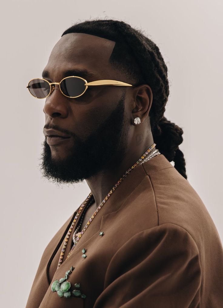 Derahback's tweet photo. Asake and burna drops a single on the same day,  who is out streaming who on the first day? https://t.co/b8P6ASrKaW