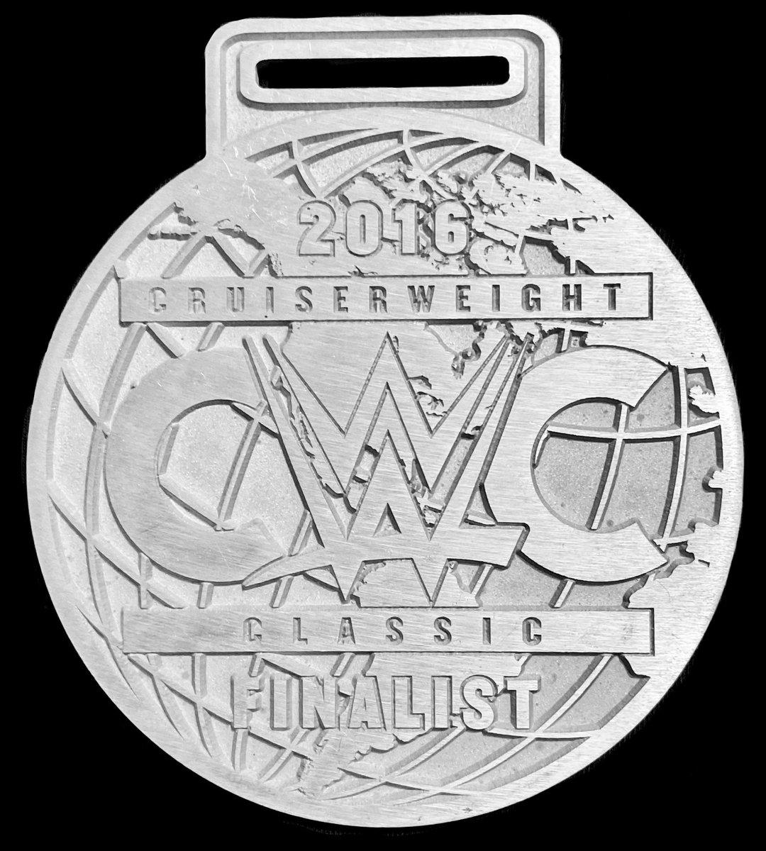 RHP4ever's tweet photo. 2016 WWE @WWE Cruiserweight Classic Finalist raw plate die cut medal. This is before the medal gets silver plating. This is a rare pre-plated die cut metal piece. The Cruiserweight Classic ran from June 23 to Sept. 14, 2016. #CruiserweightClassic #CWC #Cruiserweight #WWE #Medal https://t.co/WXwlaSeSHH