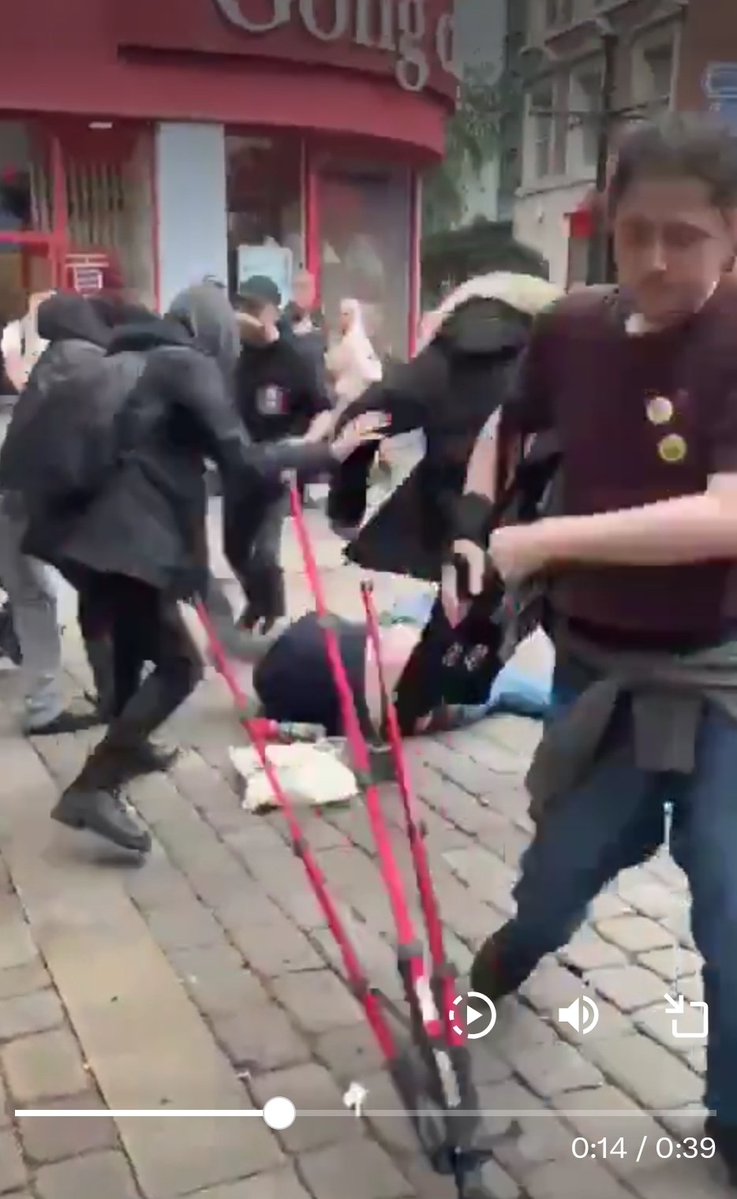 houseofcromwell's tweet photo. @YoungBobRB The dude in the maroon top stole some of you equipment, he takes it from the red tripod. https://t.co/Be0libgKdY