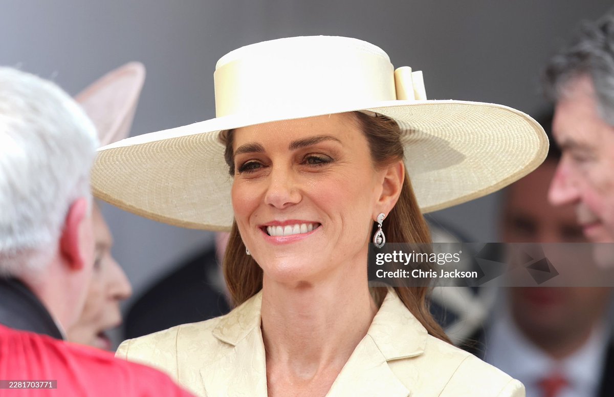 emilyinpalace's tweet photo. The Princess of Wales is wearing a coat dress made in London by Patrick McDowell.

The beautiful fabric was woven for Catherine by Stephen Walters and Sons in Suffolk. 

The matching hat is by Jane Taylor, trimmed with fabric from Stephen Walters.  

She has accessorised the look with earrings from Robinson and Pelham.