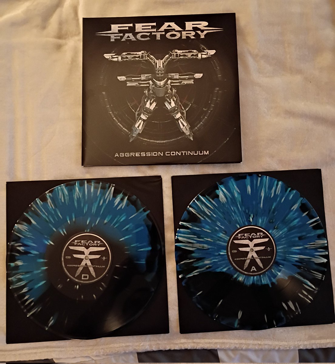 ShadowMustard's tweet photo. Fear Factory 
Aggression Continuum 
Limited Edition 1000 copies 
Black/Blue Swirl/White Splatter https://t.co/FpZYqayoGS