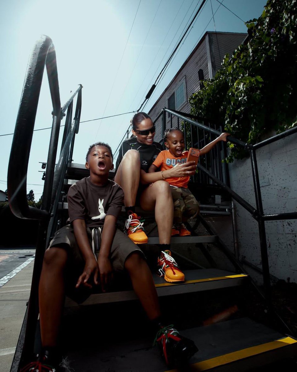 PulseNigeria247's tweet photo. Wizkid and Jada P’s children, Zion and AJ, alongside their mum, stun in new photos wearing Nike sneakers designed by Grace Ladoja. 🇳🇬🔥

The “Pan-African” and “African Sunrise” designs make Ladoja the first African woman to create signature Nike shoes. https://t.co/jFpEOKZDCe