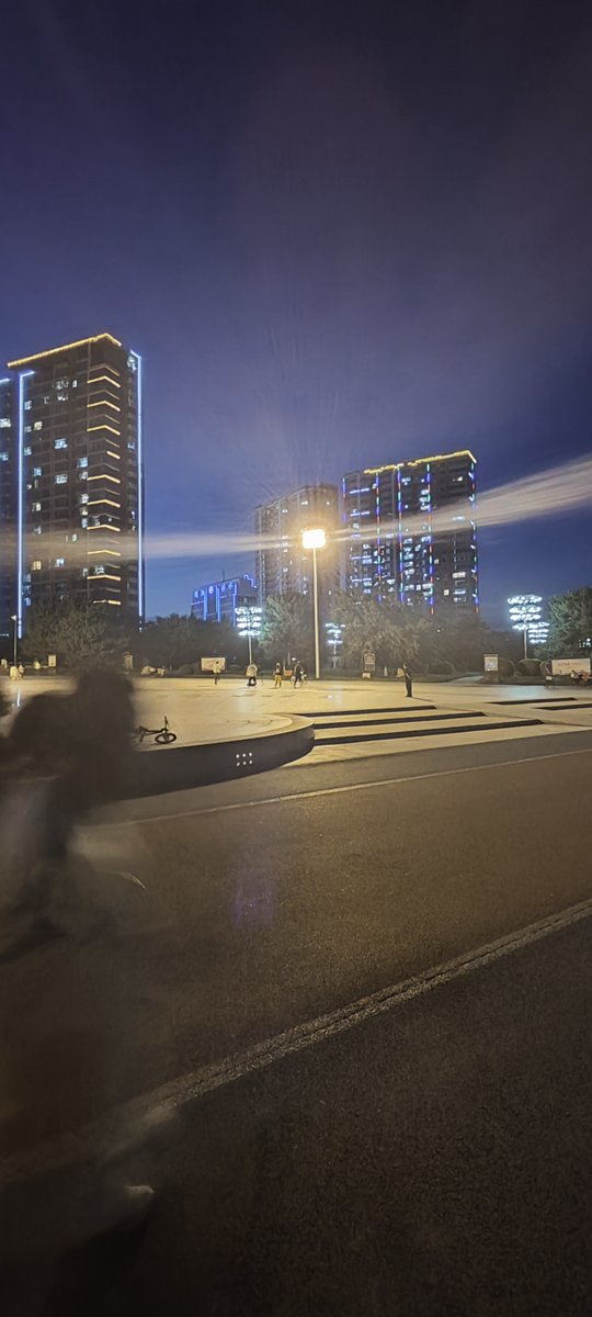 mwaleczko's tweet photo. Just a random street corner glow: neon signs, passing bikes, and that quiet, unplanned magic only city nights bring. https://t.co/KoRRObImsP