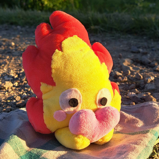 traubenbecher's tweet photo. idk if I ever posted the Calcifer plush I made on here but I took some pretty nice pics today + the infinite white void https://t.co/GC6KjqZqQi