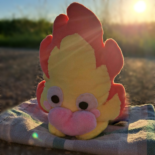 traubenbecher's tweet photo. idk if I ever posted the Calcifer plush I made on here but I took some pretty nice pics today + the infinite white void https://t.co/GC6KjqZqQi