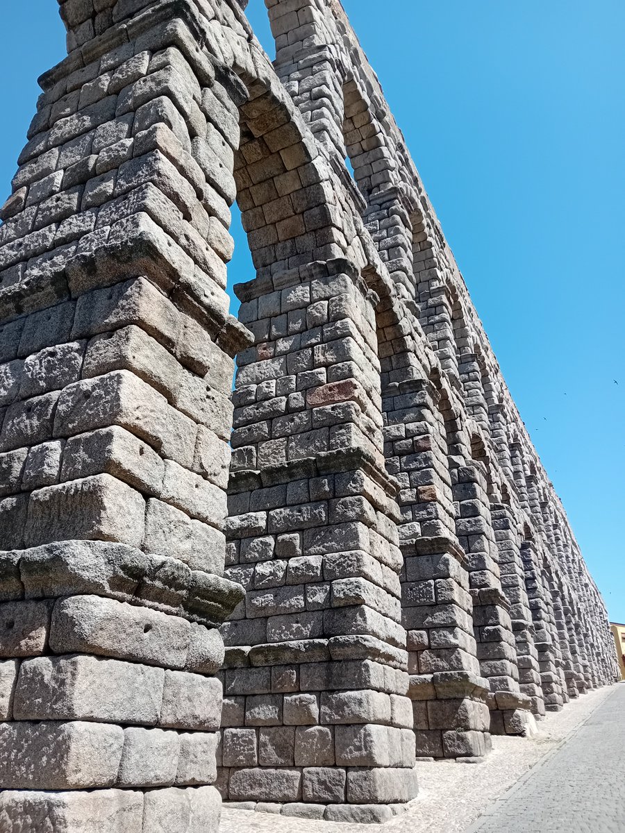 DrJEBall's tweet photo. The spectacular (if partially reconstructed) remains of the #Roman aqueduct at Segovia (Spain) - really gives a sense of how imposing these structures would have been in ancient cityscapes #Archaeology https://t.co/QQfj31zUwm