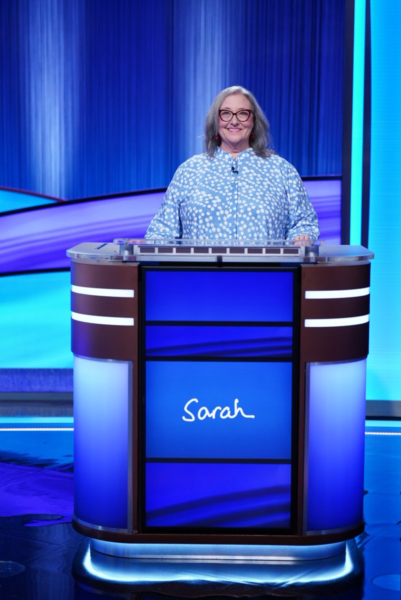 HofstraU's tweet photo. After years of watching @Jeopardy and multiple attempts to earn a spot behind the podium, Sarah McCleskey, Hofstra University Library vice dean for administrative and user services, will be a contestant in an episode airing this Tuesday, June 16th!

https://t.co/dVw8lhY0vW https://t.co/XLYVVY4Nyx