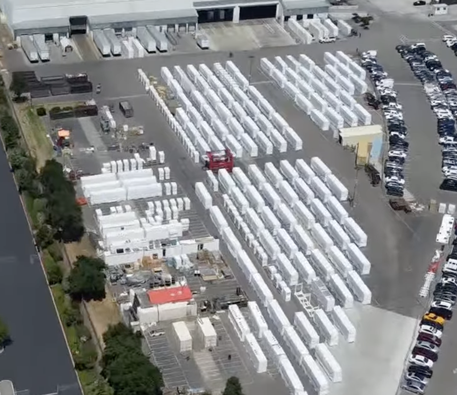 SawyerMerritt's tweet photo. Looks like @Tesla is cranking out Megapacks at FULL capacity at their Lathrop Megafactory. This is ~$500 million of Megapacks. It's been a while since we've seen footage from this factory, but this is the fullest I've even seen the lots.

(Drone video from Servants life linked below):