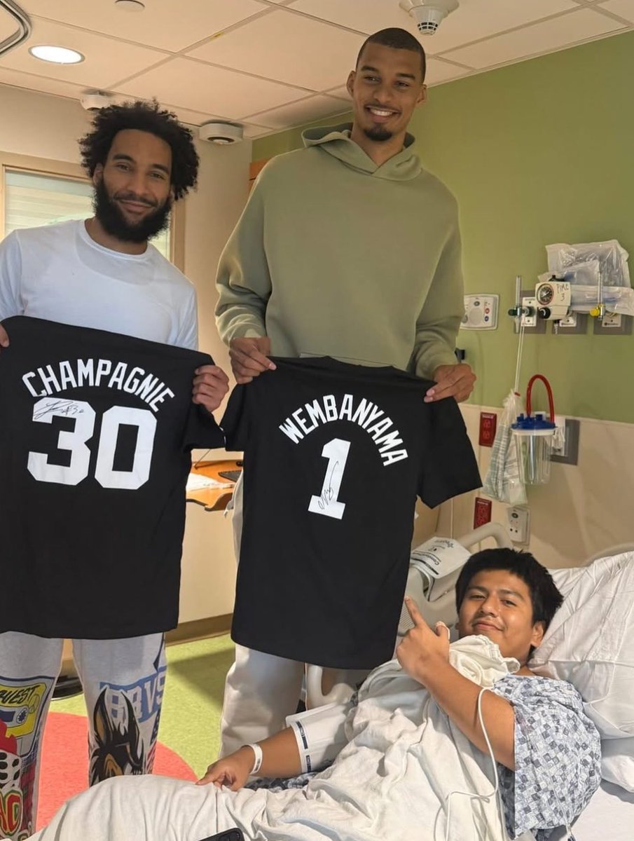 SASpursMemes's tweet photo. Victor Wembanyama and Julian Champagnie seen spending time with San Antonio kids in the hospital after their Finals loss ❤️ https://t.co/F6UmsnfuRo