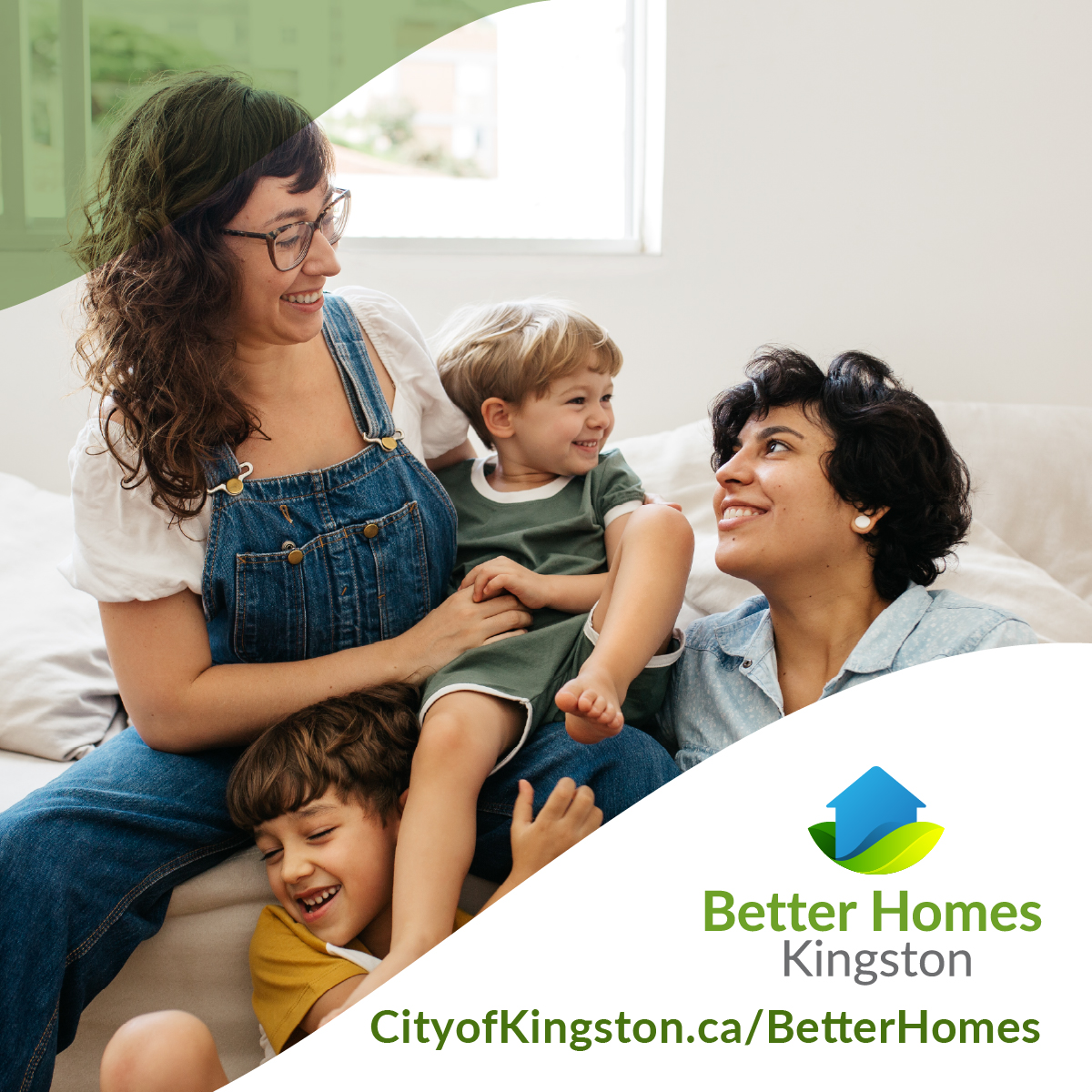 A group of people sit on a couch in a living room, smiling and interacting with each other. The image features the Better Homes Kingston logo and the text "CityofKingston.ca/BetterHomes" at the bottom.