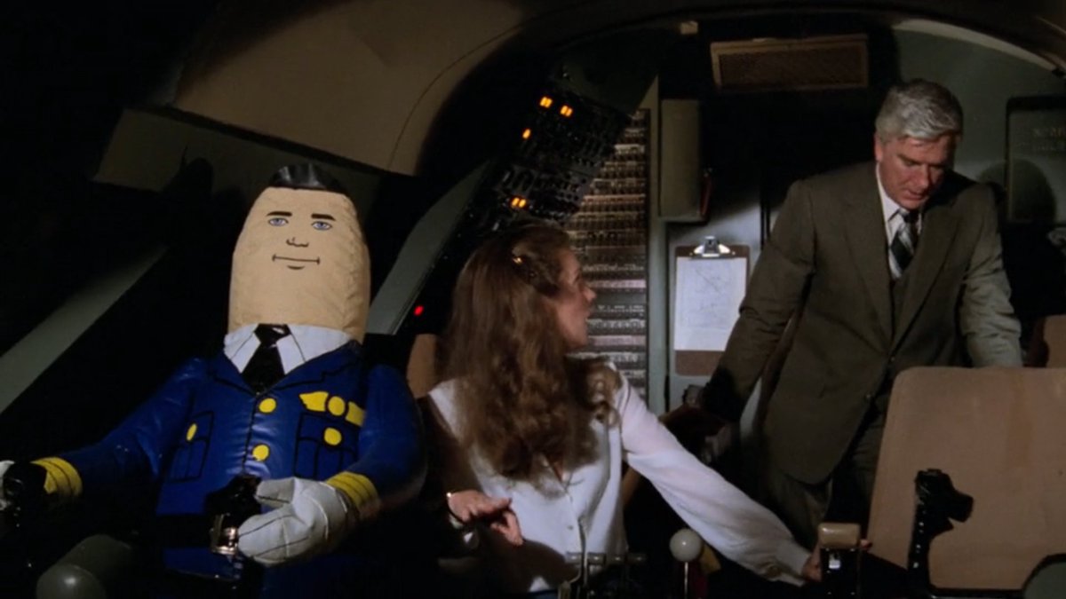 LegalizeWuhu's tweet photo. watching Airplane (1980) and... am I crazy or do yall see it https://t.co/YFEnlpuwVI
