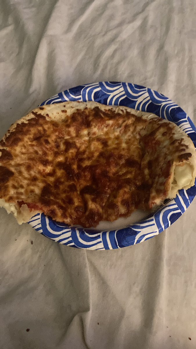 Ishmaelswork's tweet photo. They didn’t give me a fucking pizza cutter, so I’m having to eat it like this https://t.co/6TUKRZJXSH