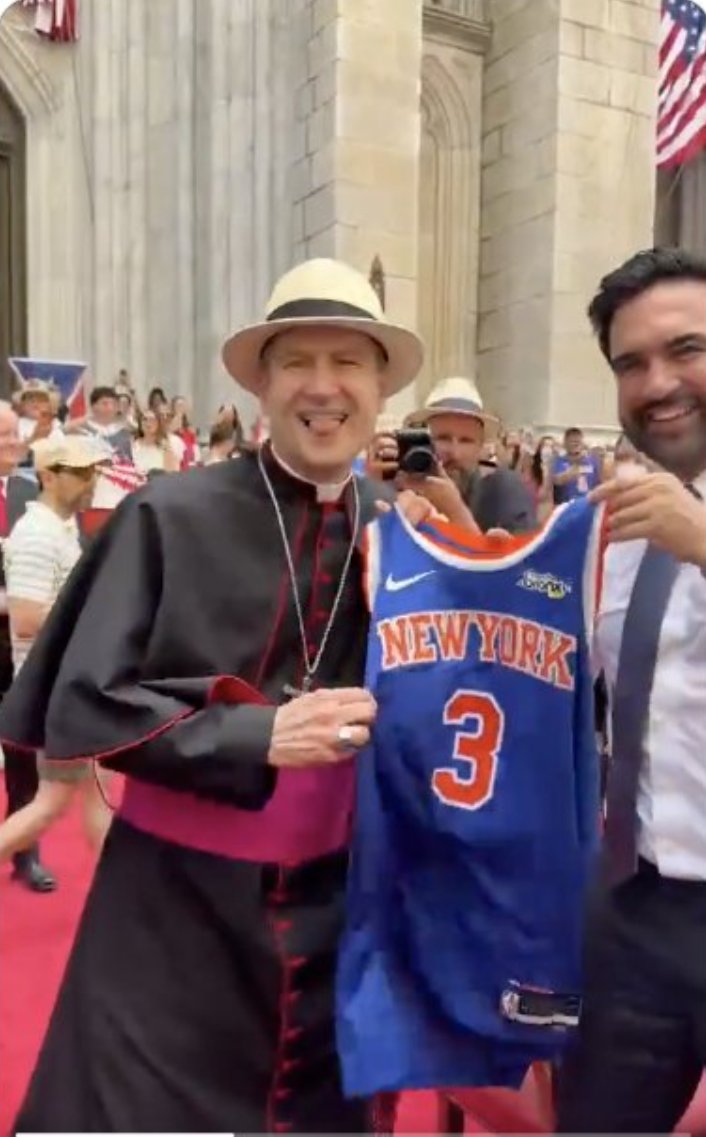 mhfmvc's tweet photo. People are commenting on the face made by Ronald Hicks (the Vatican II Sect “Archbishop” of NYC). It does remind one of Isaiah 3:9: “The look on their countenance witnesses against them, and they declare their sin as Sodom…” 

Even if he’s not a sodomite himself, he is guilty of that sin for allowing it to be endorsed, promoted and celebrated at many Vatican II Sect (Novus Ordo) churches in NYC. We have videos coming out, God willing, that will document the shocking things that are promoted at churches under Antipope Leo XIV in NYC and in many other places.