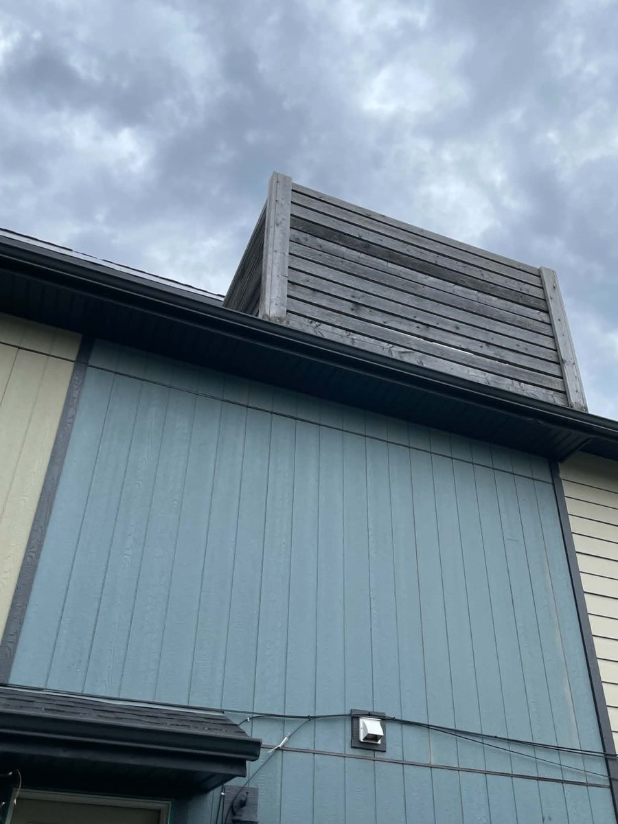 Shaybear98's tweet photo. This is an infill monstrosity built in Beverly YEG.  They built that cheap ass fence right up against my in-laws fence and it towers over their nice fence.  Not to mention the balconies built?!?!   I guess kids are always on them  🤦‍♀️ "Posts" are rotting...Yeah, that's legal  🙄 https://t.co/52j0gf3hj7