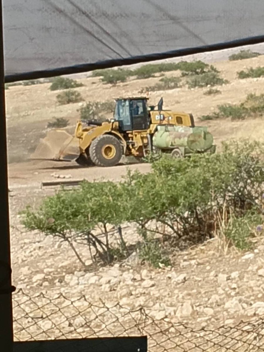 QudsNen's tweet photo. Earlier today, Israeli bulldozers destroyed agricultural structures and water tanks east of the village of Atouf in the northern Jordan Valley, northeast of the occupied West Bank, and threatened its Palestinian owner with the demolition of his home and livestock pens unless he leaves the area.