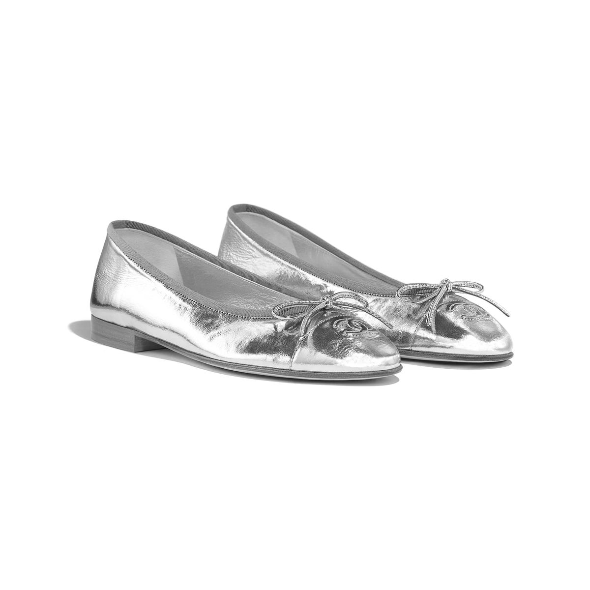 geniuswomanvibe's tweet photo. chanel silver flat shoes https://t.co/c5XowG7oWm