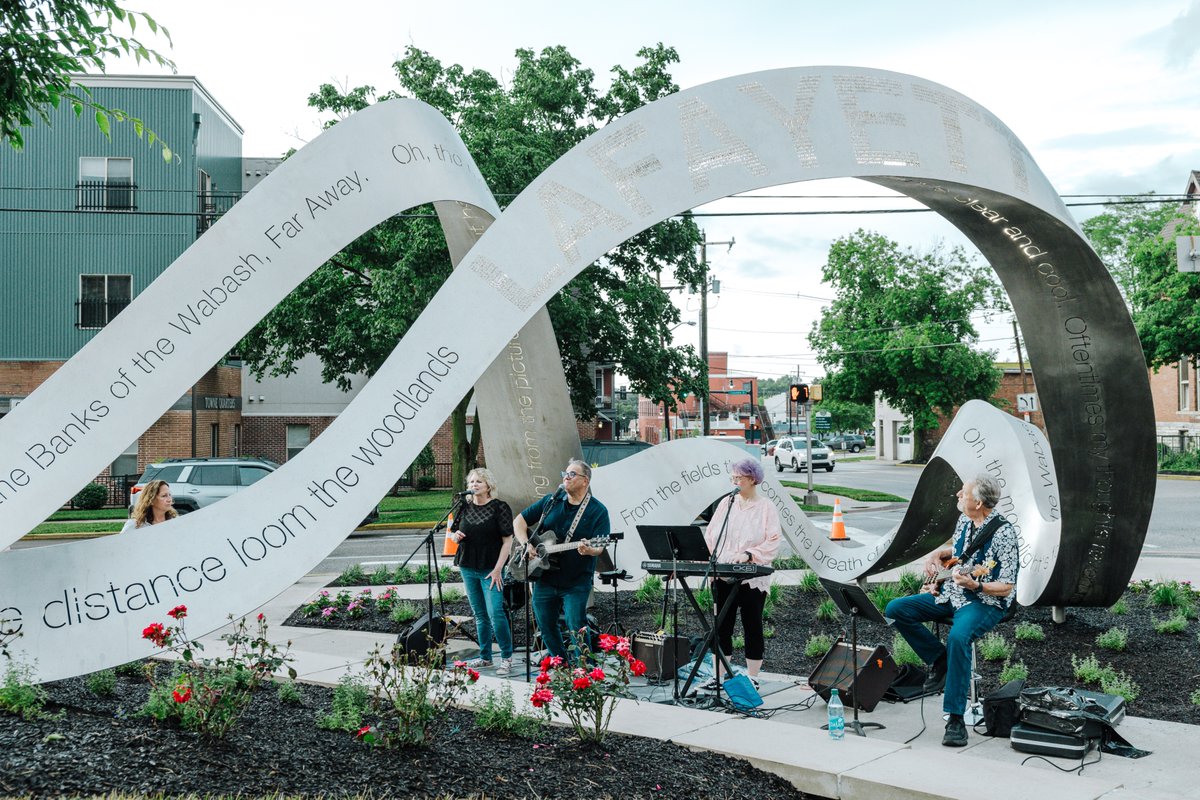 GLCommerce's tweet photo. The City of Lafayette celebrated 200 years on the Wabash in 2025. The sculpture the city commissioned to mark the occasion wasn't quite ready in time. On June 9, it was. On a stormy Tuesday evening in downtown Lafayette, the city dedicated it.

Read ➡️ https://t.co/73DFznNmqT https://t.co/uAk4isFXpG