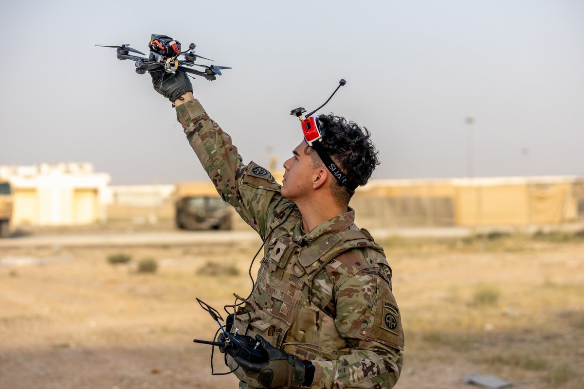 usarmycentral's tweet photo. A @USArmy paratrooper prepares to launch an unmanned aerial system (UAS) in the Middle East during a routine training event. Small UAS platforms provide units with real-time aerial observation capabilities that assist with reconnaissance, security, and terrain analysis. https://t.co/rnB908PwXN