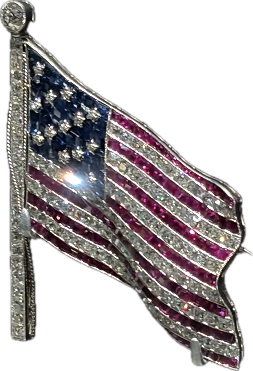 gemprospects's tweet photo. Platinum, diamond, ruby, and sapphire American flag brooch https://t.co/8HT2NZAJVZ