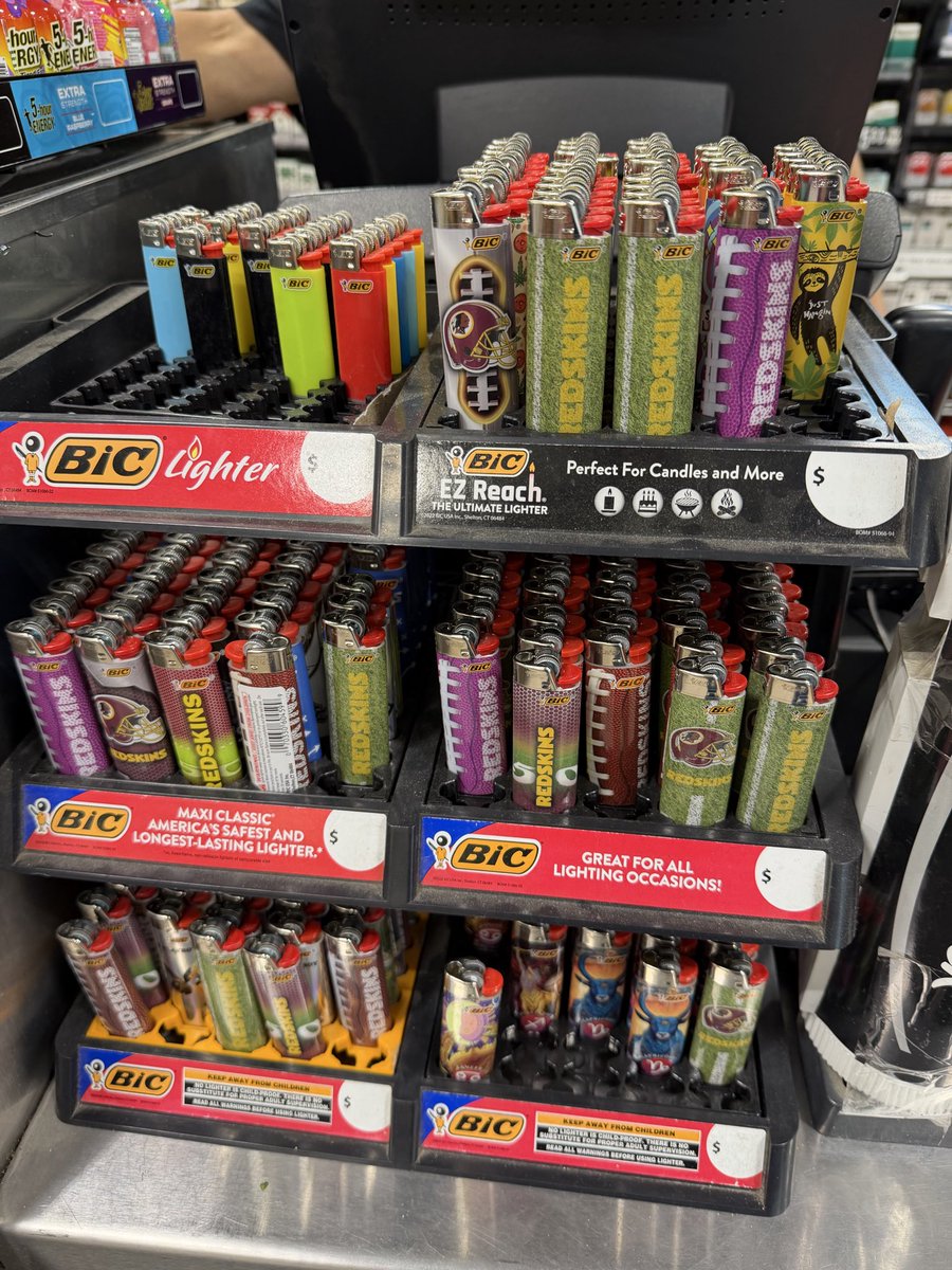 JPFinlayNBCS's tweet photo. Got this photo from a friend in East Greenbush NY. Some gas station apparently has every Skins lighter ever made. How much you paying for the set? https://t.co/JCsAdZUFDv
