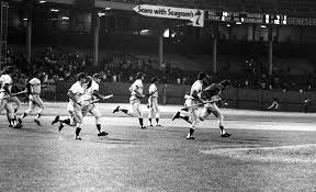 10CentBeer's tweet photo. The Rangers charged the field w/bats &amp; yes, the Indians, saved the Rangers. Organist Art Brose continued to play while little battles raged on around the field. An opportunistic Dad dropped his kid on the field and told him to run the bases, but SOMEONE HAD STOLEN THE BASES. https://t.co/RopgFT3zuR