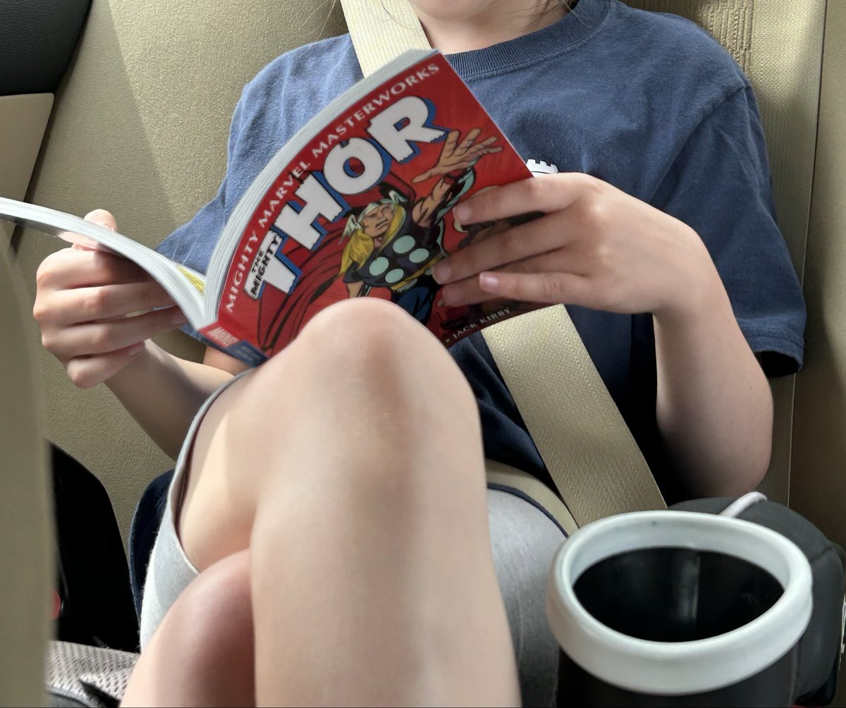 BryanBaugh's tweet photo. I’ve been buying those exact little paperback reprint books of the 1960s Marvel comics for my 8 year old and she LOVES them.

She discovered the Marvel heroes thru the early (good) MCU movies and cartoons. She’s always been a little bookworm, so I got her those paperbacks and she has been devouring them cover to cover. 

They are very kid friendly in size and format. She especially likes to read them in the car, aloud to me, while I’m driving. She likes Spider-Man and Hulk, but Thor is her favorite.

Seeing my own child respond so enthusiastically to those little paperbacks has been a real eye opener for me, as a jaded old comics fan, who assumed all hope was lost for the future of this medium, with modern kids.

Now I can’t help wondering if those little paperbacks might be THE ideal way to introduce comics to kids around her age - who like the characters from the movies - and who are still too young and innocent to have pretentious adult notions about “dated” writing & art styles.