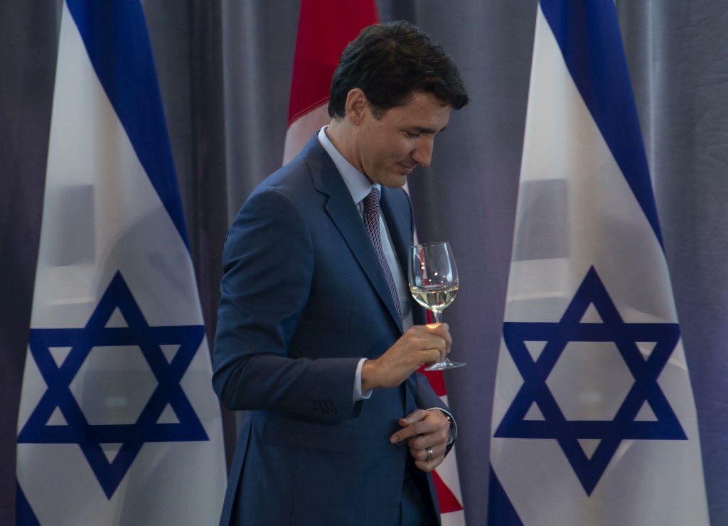 HumanityStrong's tweet photo. @LoveMy7Wood Canadians are endangered by their government's close relationship with Israel. It's time to sanction Israel and cut ties with Israeli lobbies. Canadians are fighting back. We won't let Israel destroy Canada. #Enough https://t.co/GbUQ87iKl4