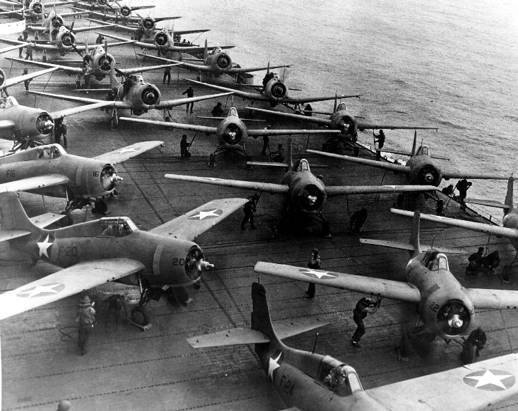 VoicesofWW2's tweet photo. F4F-4 Wildcat fighters and SBD Dauntless dive bombers being prepared to launch from the flight deck of USS Hornet, off Midway, 4 Jun 1942 https://t.co/mDlhbE0ftT