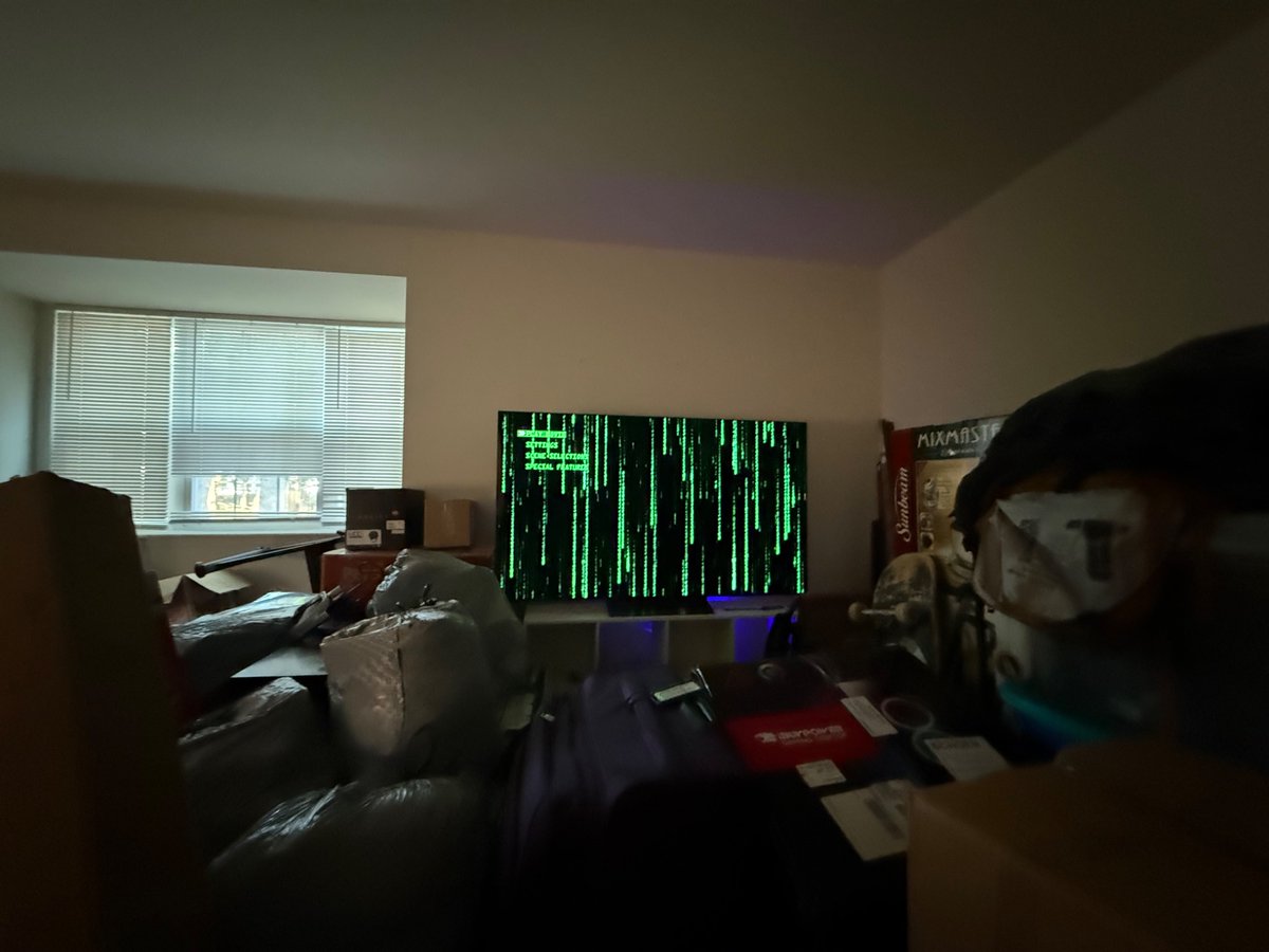 DoopeeTim's tweet photo. When you’re moving in two days but it’s time to watch The Matrix https://t.co/FDda92yl5W
