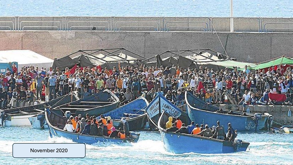 darenci's tweet photo. EL MUELLE DE LA VERGÜENZA. 
Los policías tenían miedo. Como todos. Miedo al Covid. Nadie quería estar cerca de personas que llegaban de África sin vacunar. Por eso se les llevó al muelle. Allí corría más el aire y se podía guardar distancia. https://t.co/mPZoN0TTnP