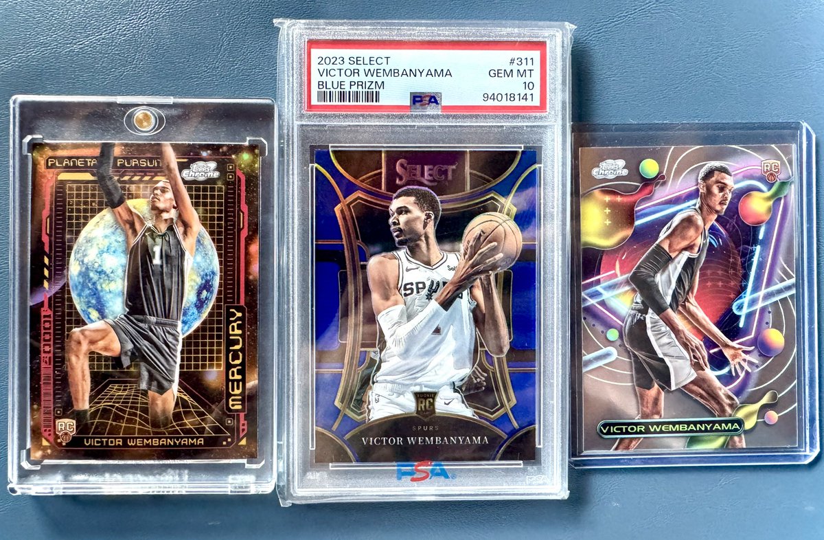OwningTheFloat's tweet photo. Found these bad boys in a box of cards I had. I don’t even remember having the Select graded and pulling the other 2 from @Topps Chrome Cosmic! Today was a good day! How much are they worth? Victor Wembanyama RC cards. #NBA #NBAFinals #VictorWembanyama #Spurs @NBA 😳 https://t.co/JROnj0UuxS
