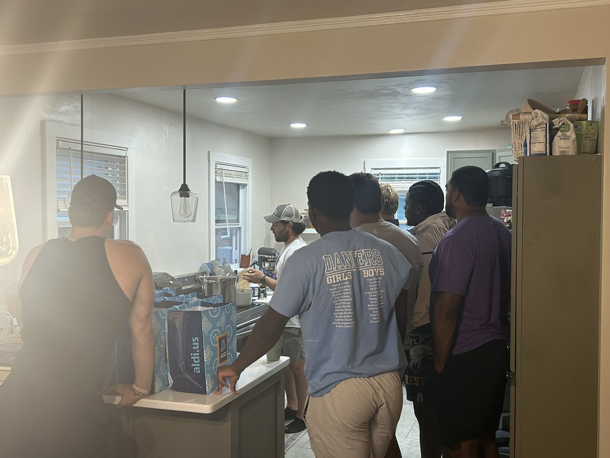 HanNussbaum's tweet photo. Took our now-sophomores on a grocery run and taught them how to make spaghetti! Living on their own for the first time, we gotta set them up for success! @coachcjnuss 💜 #EverLoyal 

@AldiUSA these football players are now big fans! https://t.co/UqRf0CzM4w