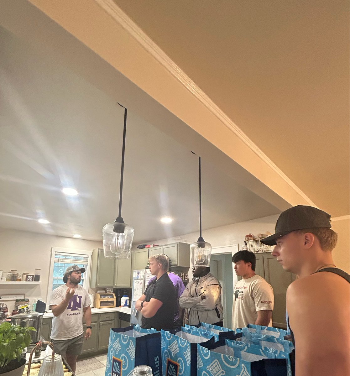 HanNussbaum's tweet photo. Took our now-sophomores on a grocery run and taught them how to make spaghetti! Living on their own for the first time, we gotta set them up for success! @coachcjnuss 💜 #EverLoyal 

@AldiUSA these football players are now big fans! https://t.co/UqRf0CzM4w